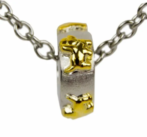 A silver pendant with gold dogs on a chain that would make a great pet memorialization tribute
